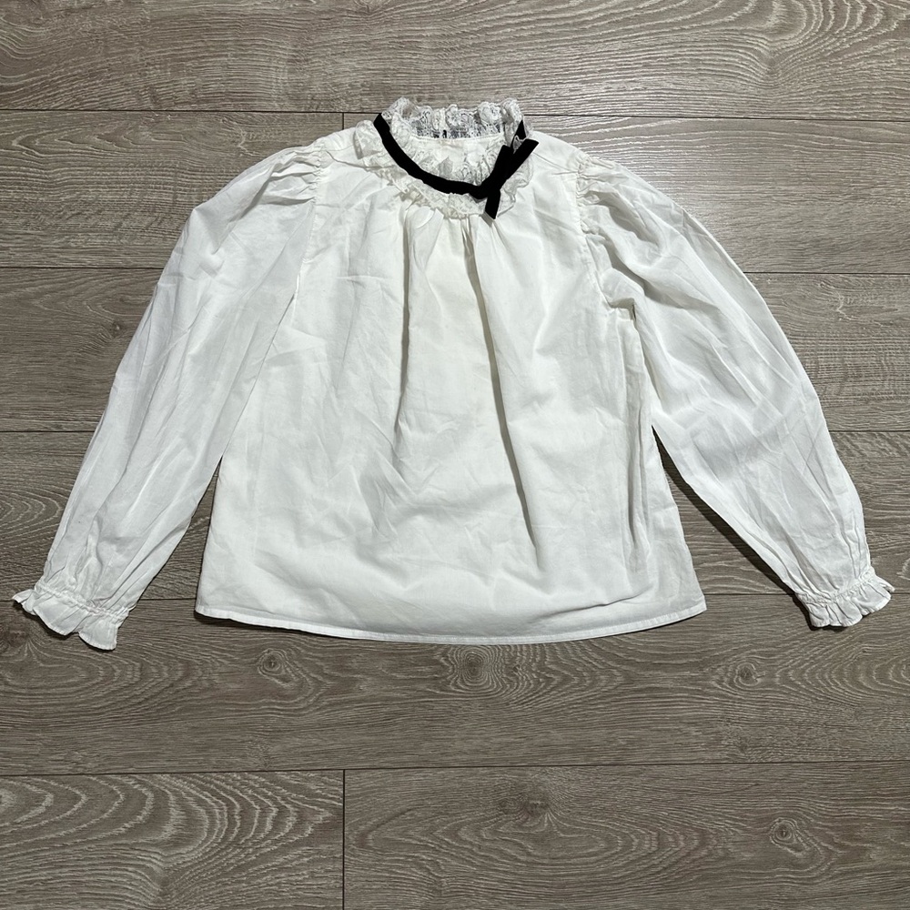 Elegant White Blouse with Black Trim